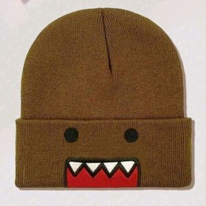 Brown Knit Beanie with Domo Design